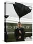 President Bush Jokingly Holds His Wind-Blown Umbrella Upright-null-Stretched Canvas