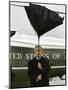 President Bush Jokingly Holds His Wind-Blown Umbrella Upright-null-Mounted Photographic Print