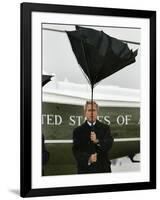 President Bush Jokingly Holds His Wind-Blown Umbrella Upright-null-Framed Photographic Print