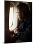 President Bush Looks out the Window of Air Force One Over New Orleans-null-Mounted Premium Photographic Print