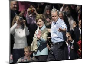 President Bush, Right, and First Lady Laura Bush Arrive for a Rally for Texas Governor Rick Perry-Lm Otero-Mounted Photographic Print