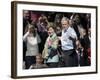 President Bush, Right, and First Lady Laura Bush Arrive for a Rally for Texas Governor Rick Perry-Lm Otero-Framed Photographic Print