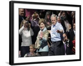 President Bush, Right, and First Lady Laura Bush Arrive for a Rally for Texas Governor Rick Perry-Lm Otero-Framed Photographic Print