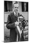 President Calvin Coolidge Holding an American Flag. May 2, 1924-null-Mounted Photo