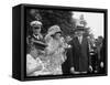 President Calvin Coolidge Smiles Along with His Wife at a White House Garden Party in June 1926-null-Framed Stretched Canvas