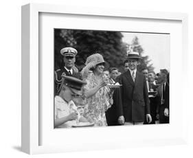 President Calvin Coolidge Smiles Along with His Wife at a White House Garden Party in June 1926-null-Framed Art Print
