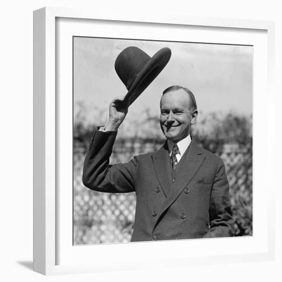 President Calvin Coolidge Waves a Hat Presented to Him by Smoki People of Prescott, Arizona-null-Framed Photo