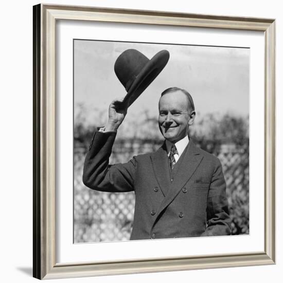 President Calvin Coolidge Waves a Hat Presented to Him by Smoki People of Prescott, Arizona-null-Framed Photo