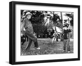 President Eisenhower Adds a Little 'Body English' to David Eisenhower's Golf Swing-null-Framed Photo