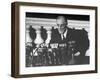 President Franklin D. Roosevelt Sitting in Front of a Network Radio Microphones-George Skadding-Framed Photographic Print