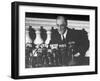 President Franklin D. Roosevelt Sitting in Front of a Network Radio Microphones-George Skadding-Framed Photographic Print