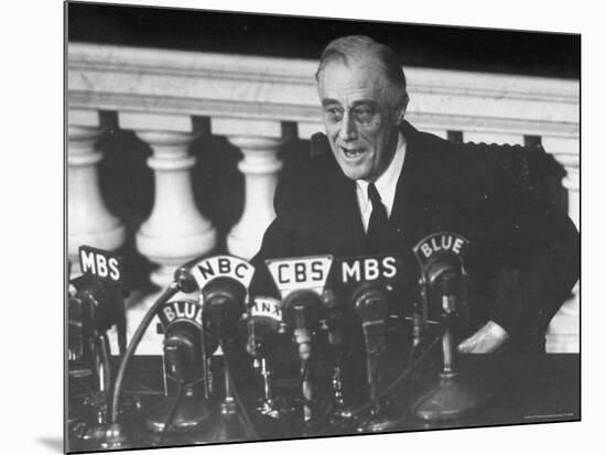 President Franklin D. Roosevelt Sitting in Front of a Network Radio Microphones-George Skadding-Mounted Photographic Print