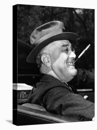 President Franklin Roosevelt, Debonair with His Cigarette Holder, 1939-null-Stretched Canvas