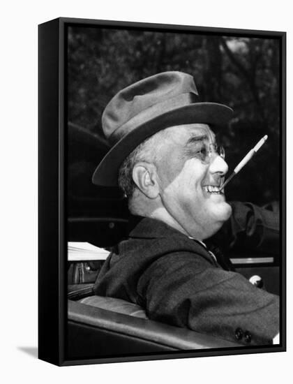 President Franklin Roosevelt, Debonair with His Cigarette Holder, 1939-null-Framed Stretched Canvas