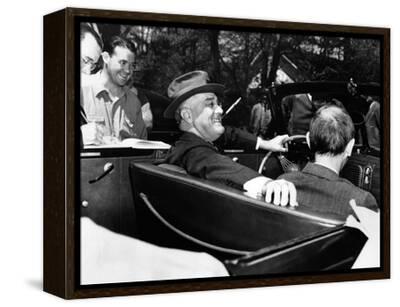 franklin roosevelt cigarette holder President Roosevelt, debonair with his holder. He is at the wheel of his customized auto in 1939 Stock Photo President Franklin D. Roosevelt, smoking