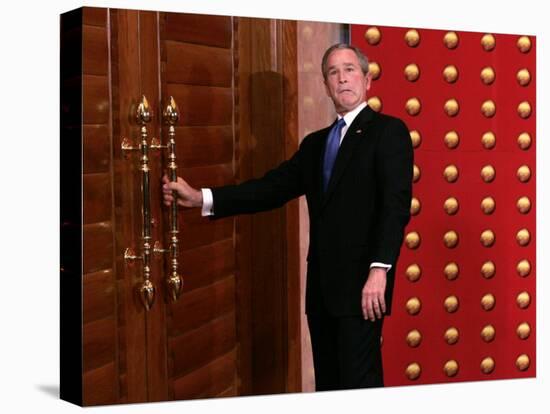 President George W. Bush as He Tries to Open a Locked Door Leaving a Press Conference in Beijing-null-Stretched Canvas