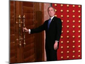 President George W. Bush as He Tries to Open a Locked Door Leaving a Press Conference in Beijing-null-Mounted Photographic Print