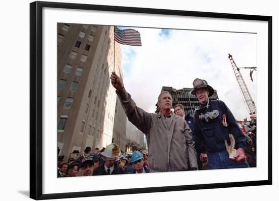 President George W. Bush Waves an American Flag after Addressing Recovery Workers in Nyc-null-Framed Photo