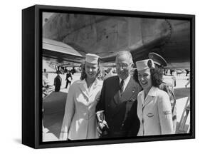 President Harry S. Truman Standing Near a Plane Flanked by Stewardesses-null-Framed Stretched Canvas