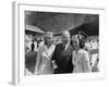 President Harry S. Truman Standing Near a Plane Flanked by Stewardesses-null-Framed Photographic Print