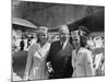 President Harry S. Truman Standing Near a Plane Flanked by Stewardesses-null-Mounted Photographic Print