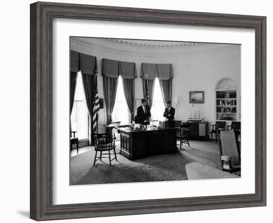 President John F. Kennedy in Oval Office with Brother, Attorney General Robert F. Kennedy-Art Rickerby-Framed Photographic Print