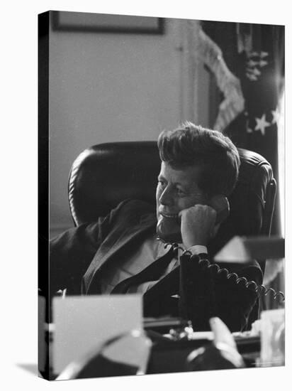 President John F. Kennedy on the Telephone in the Oval Office During the Steel Crisis-Art Rickerby-Stretched Canvas