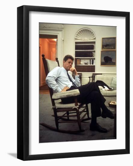 President John F. Kennedy Sitting in Rocking Chair in His White House Office-Paul Schutzer-Framed Photographic Print