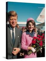 President John F. Kennedy Standing with Wife Jackie After Their Arrival at the Airport-Art Rickerby-Stretched Canvas