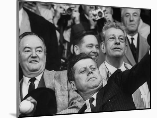 President John F. Kennedy Tossing Out 1st Ball of Baseball Season at Senators Game-Joe Scherschel-Mounted Photographic Print