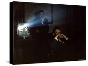 President John F. Kennedy Viewing a Film in Press Secretary Pierre Salinger's Office-Paul Schutzer-Stretched Canvas