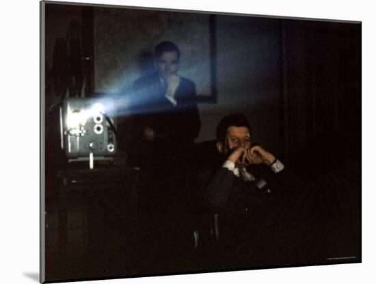 President John F. Kennedy Viewing a Film in Press Secretary Pierre Salinger's Office-Paul Schutzer-Mounted Photographic Print