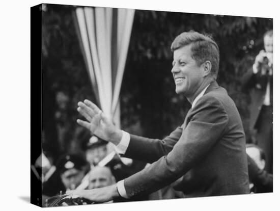 President John F. Kennedy, Waving at Crowd During Speech-John Dominis-Stretched Canvas