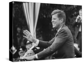 President John F. Kennedy, Waving at Crowd During Speech-John Dominis-Stretched Canvas