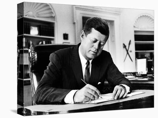 President John F. Kennedy Working at His Desk in the Oval Office of the White House-Alfred Eisenstaedt-Stretched Canvas