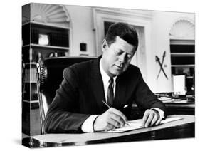 President John F. Kennedy Working at His Desk in the Oval Office of the White House-Alfred Eisenstaedt-Stretched Canvas
