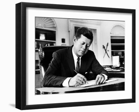 President John F. Kennedy Working at His Desk in the Oval Office of the White House-Alfred Eisenstaedt-Framed Photographic Print