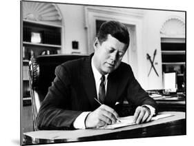 President John F. Kennedy Working at His Desk in the Oval Office of the White House-Alfred Eisenstaedt-Mounted Photographic Print