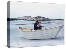 President John Kennedy and John Jr. Play in a Beached Rowboat at Newport, Rhode Island. 1962-null-Stretched Canvas