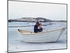 President John Kennedy and John Jr. Play in a Beached Rowboat at Newport, Rhode Island. 1962-null-Mounted Photo
