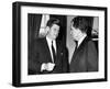 President John Kennedy Confers with Former Vice President Richard Nixon-null-Framed Photo