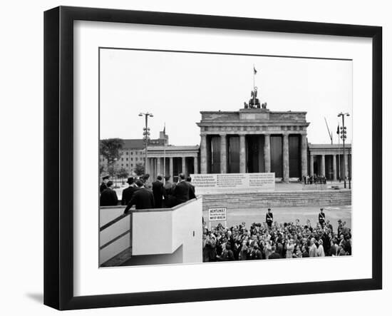 President John Kennedy Visits the Berlin Wall-null-Framed Photo