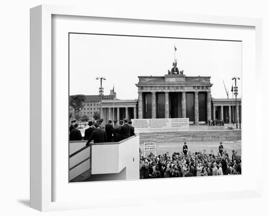 President John Kennedy Visits the Berlin Wall-null-Framed Photo