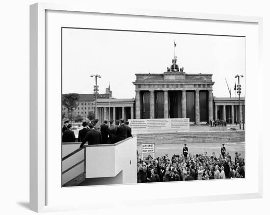 President John Kennedy Visits the Berlin Wall-null-Framed Photo