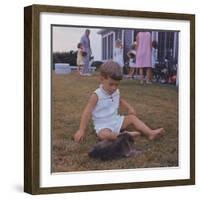 President Kennedy's Two Year Old Son, John Jr. Playing with a Puppy, Aug. 3, 1963-null-Framed Photo