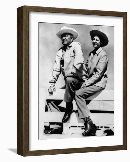 President Lyndon and Lady Bird Johnson Sitting on a Fence at the LBJ Ranch-null-Framed Photo