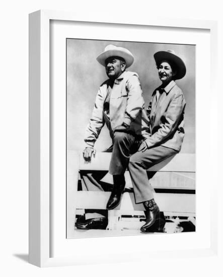 President Lyndon and Lady Bird Johnson Sitting on a Fence at the LBJ Ranch-null-Framed Photo