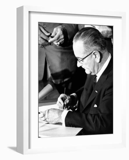 President Lyndon Johnson Signing the 1964 Civil Rights Bill, July 2, 1964-null-Framed Photo