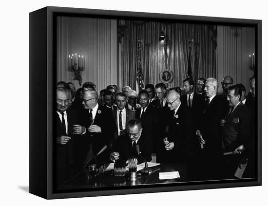 President Lyndon Johnson, Watched by Martin Luther King, Jr. Signing Civil Rights Act, July 2, 1964-null-Framed Stretched Canvas