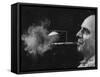 President of Zeus Corp., Robert Stern, Smoking from Self-Designed "Rainy Day" Cigarette Holder-Yale Joel-Framed Stretched Canvas